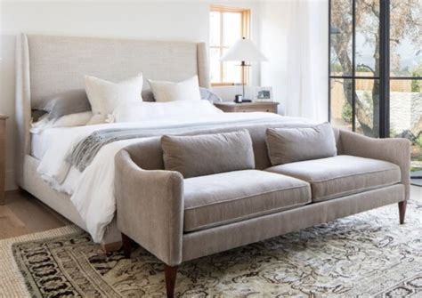 couch at the end of bed