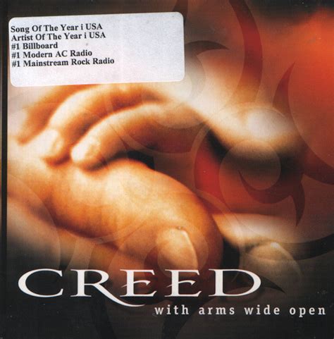 creed with arms wide