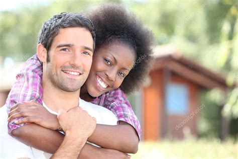 define interracial dating