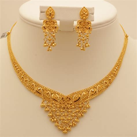 female gold necklace