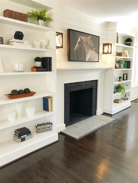 fireplace with shelves