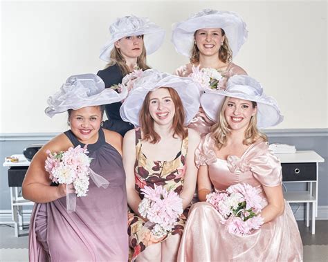 five women wearing the same dress Doc