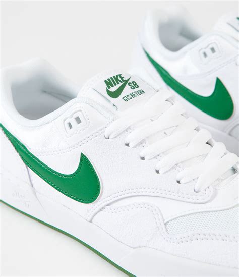 green and white sneakers