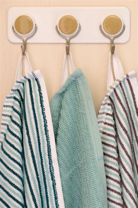 hang a white dish towel in the window tonight Reader