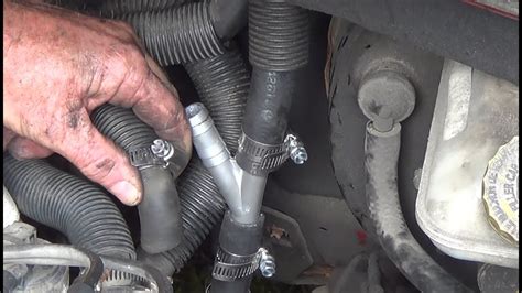 how to change grand caravan heater hose PDF