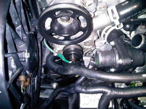 how to install a 2009 ford escape water pump belt Doc