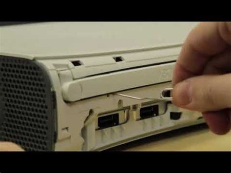 how to manually open the xbox 360 tray Reader