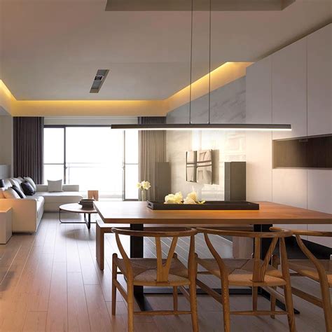 Side-by-side comparison of direct vs diffused linear lighting over a kitchen island