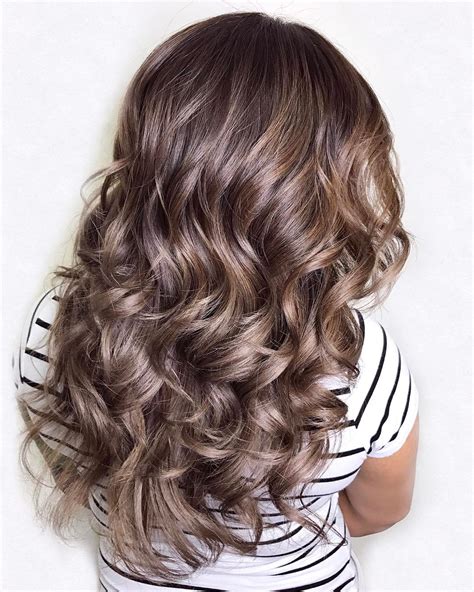 layered haircuts for long curly hair