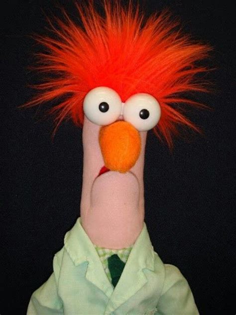 muppet with orange hair