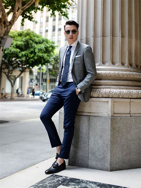 navy pants and grey blazer