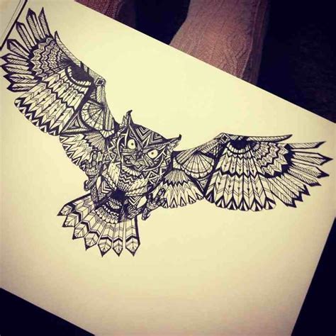 owl wings tattoo