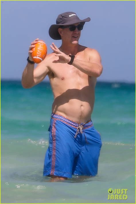 peyton manning shirt off