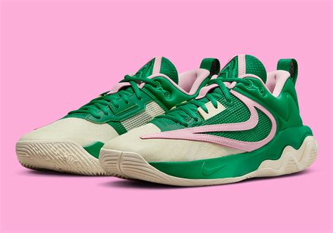 pink and green nike shoes