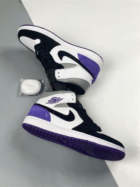 purple and black jordans 1