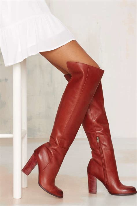 red leather knee high boots