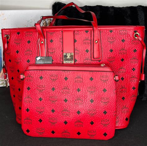 red mcm purse