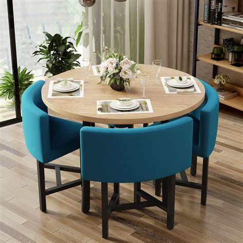 round dining table and four chairs