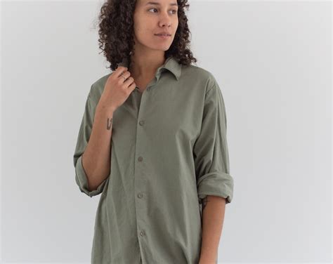 sage green button up shirt