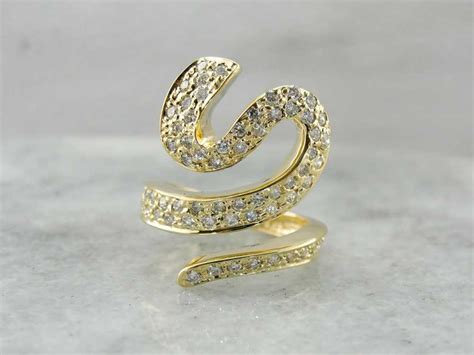 serpent rising from a stylized diamond