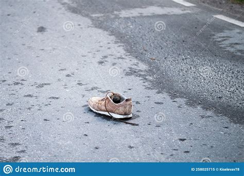 shoes stuck to asphalt