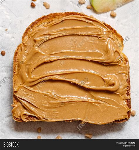 spread peanut butter thin seen Reader