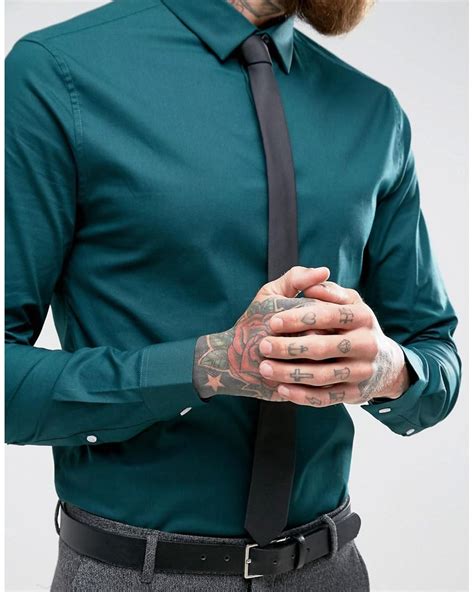 teal and black shirt