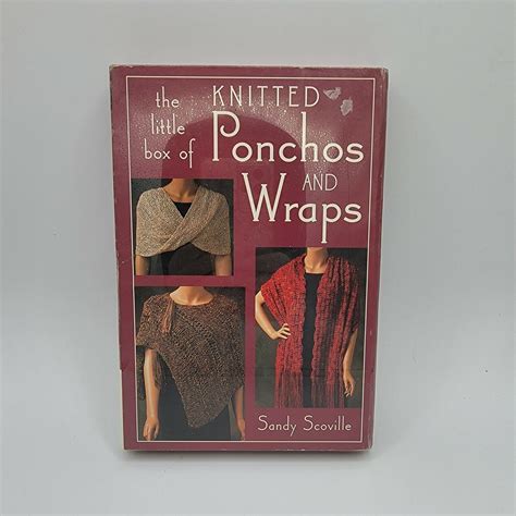 the little box of knitted ponchos and wraps Doc