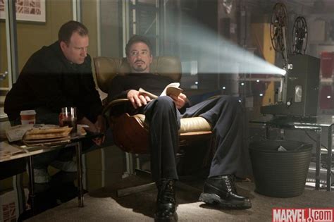 tony stark sitting in chair