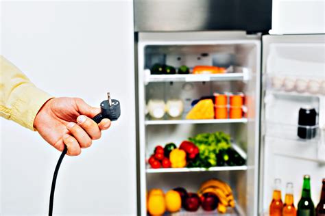 unplugging a refrigerator
