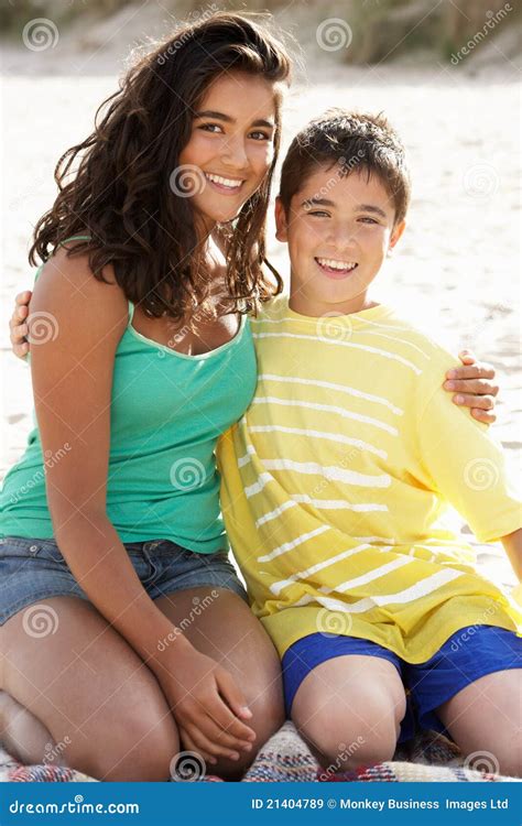 walking in the beach while talking with sister and brother