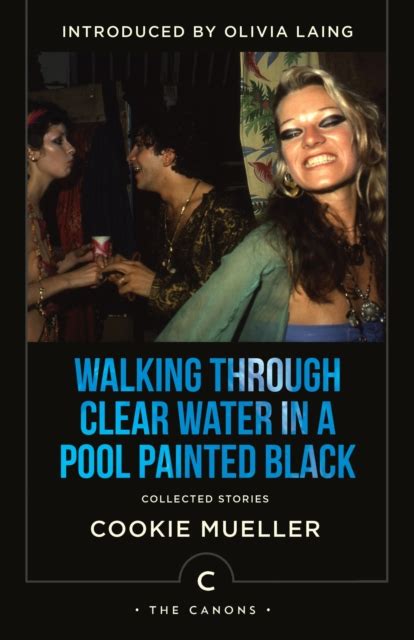 walking through clear water in a pool painted black native agents Doc