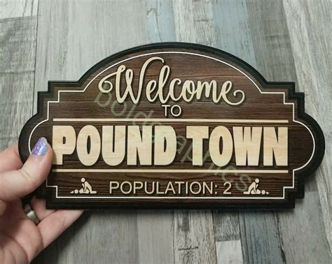 welcome to pound town sign