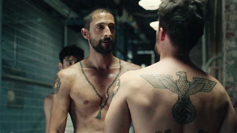 what tattoo is adrien brody using in the movie the experiment Reader