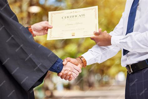 which hand to receive the diploma