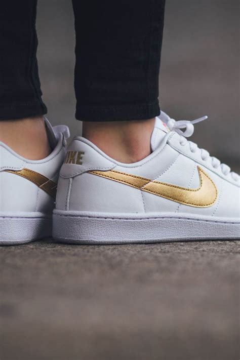 white and gold sneakers