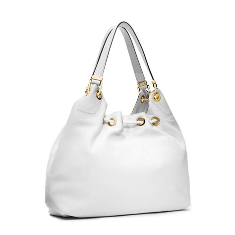 white leather bag