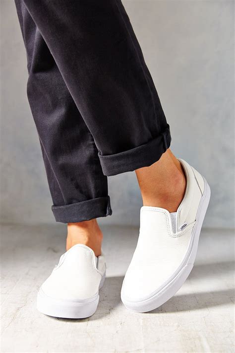 white leather slip on sneakers