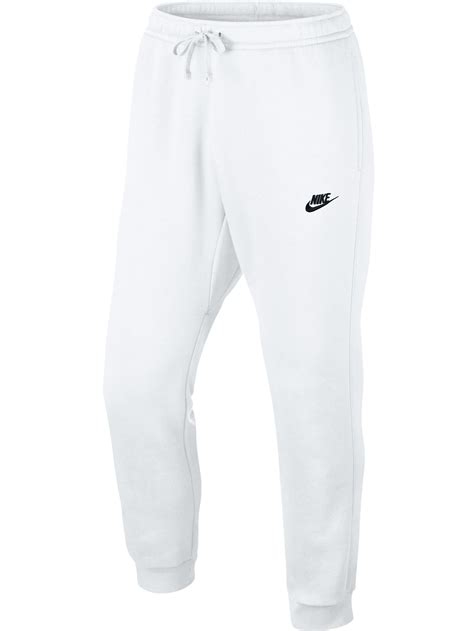 white nike trousers