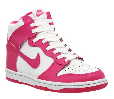 white pink nike shoes