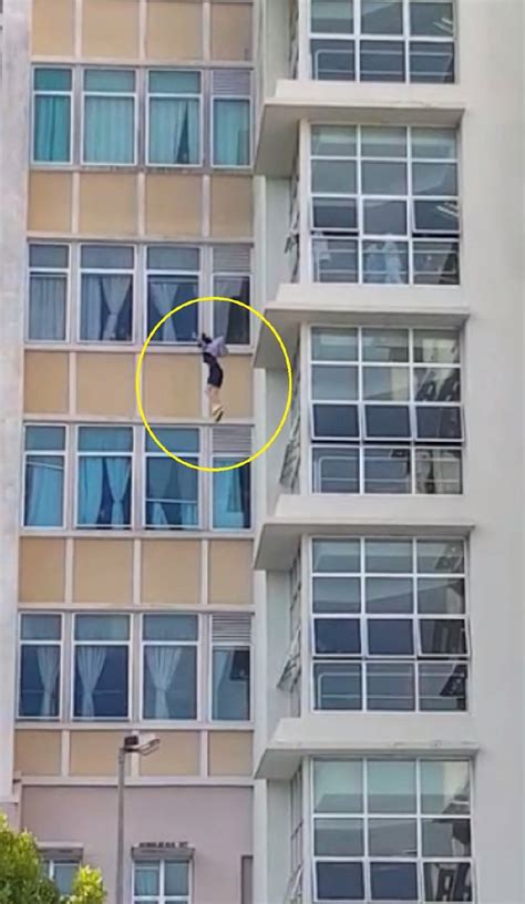 woman jumps off building yesterday singapore