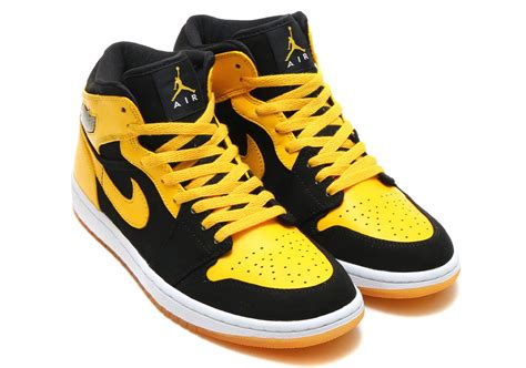 yellow and black jordans