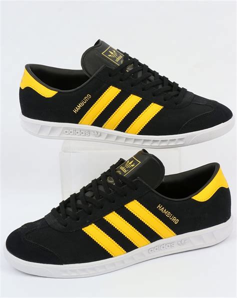 yellow black adidas shoes